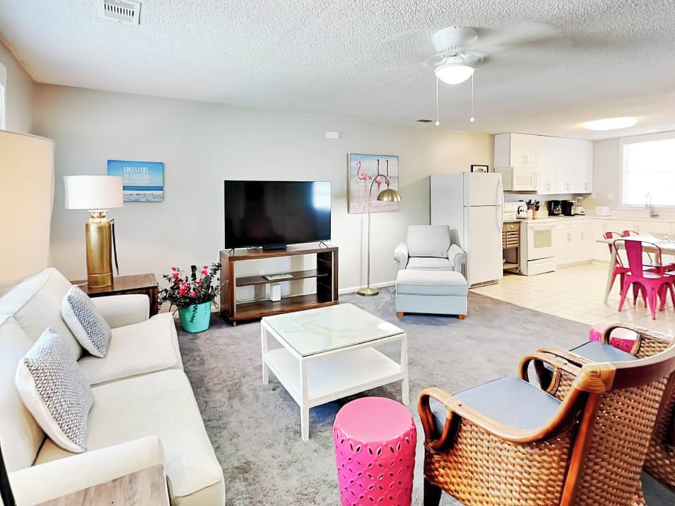 Condo, Multiple Beds, Kitchen, Garden View | Living area | TV