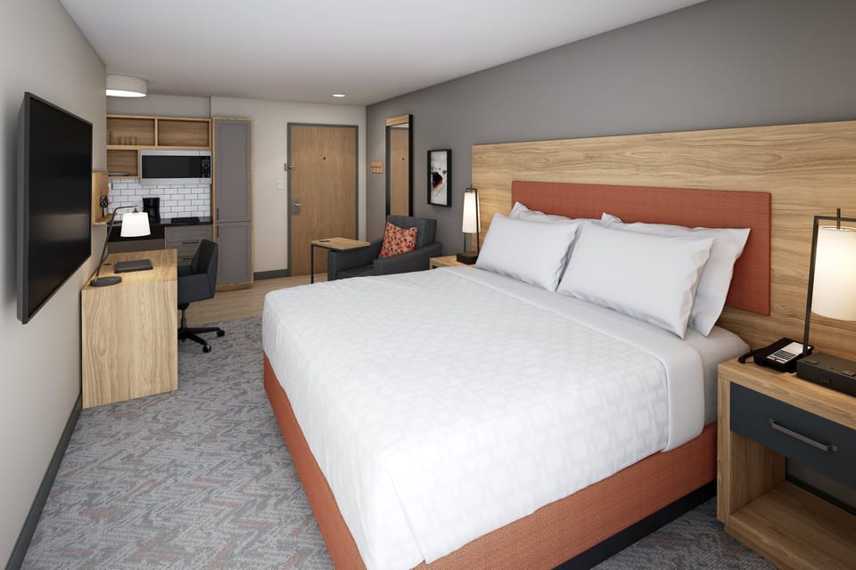 Desk, laptop workspace, free WiFi, bed sheets