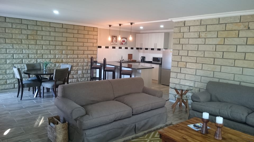 Deluxe Apartment, 2 Bedrooms | Living area | 42-inch flat-screen TV with satellite channels, TV