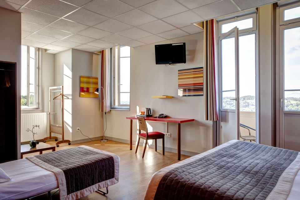 Triple Room | Premium bedding, desk, laptop workspace, soundproofing