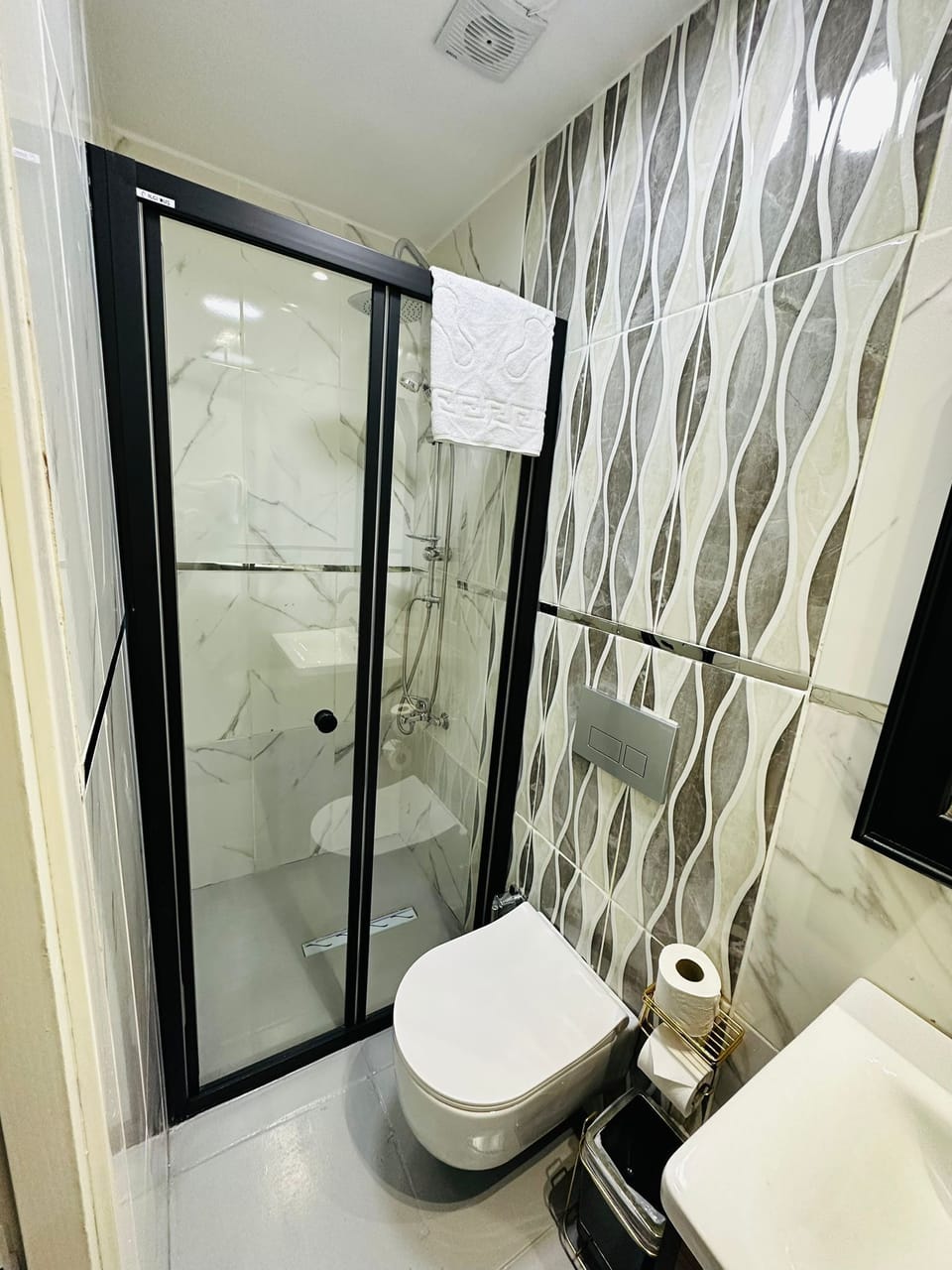 Shower, hair dryer, slippers, heated floors