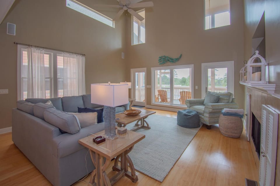 House, Multiple Beds, Balcony, Garden View | Living area | 40-inch TV with digital channels