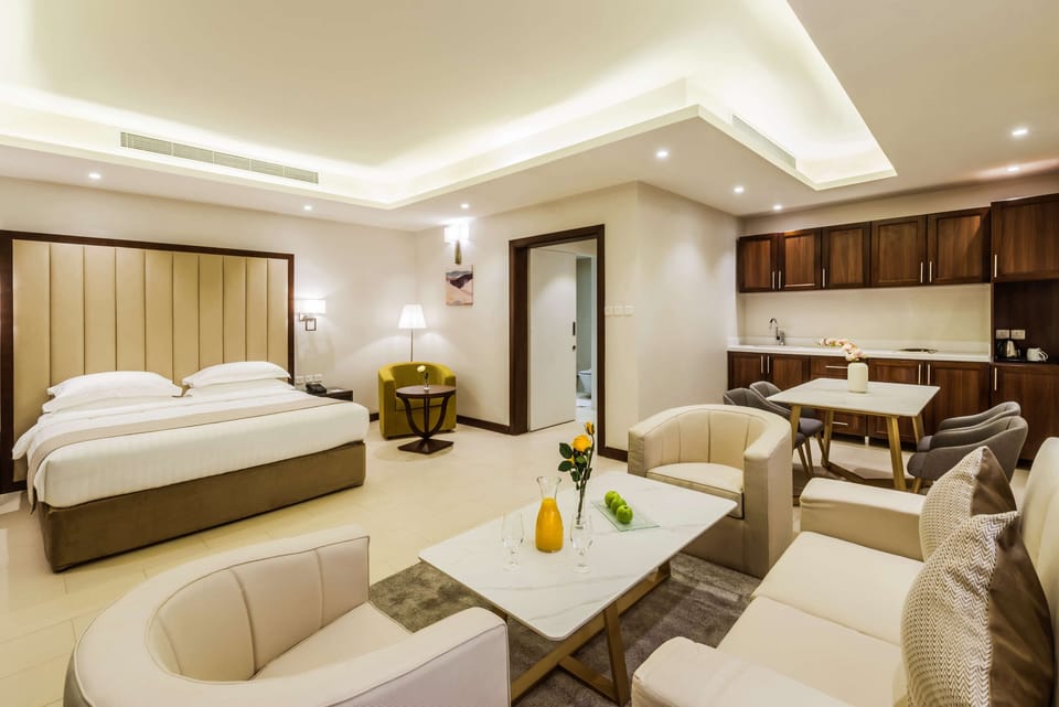 Junior Suite, 1 King Bed, Non Smoking (Dining Table) | Minibar, in-room safe, desk, soundproofing