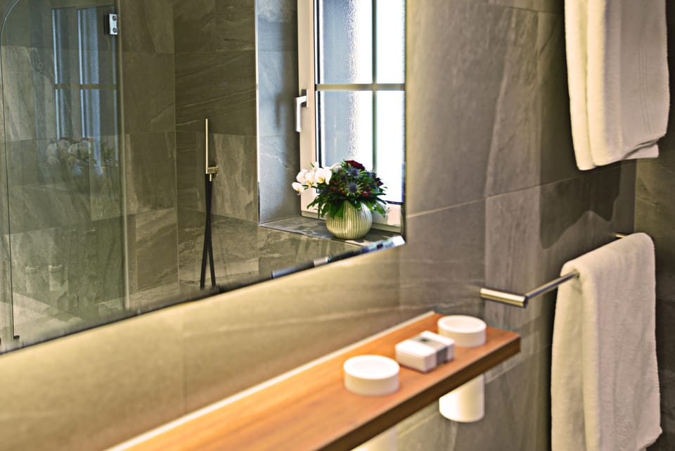 Classic Double Room | Bathroom | Designer toiletries, hair dryer, bathrobes, slippers