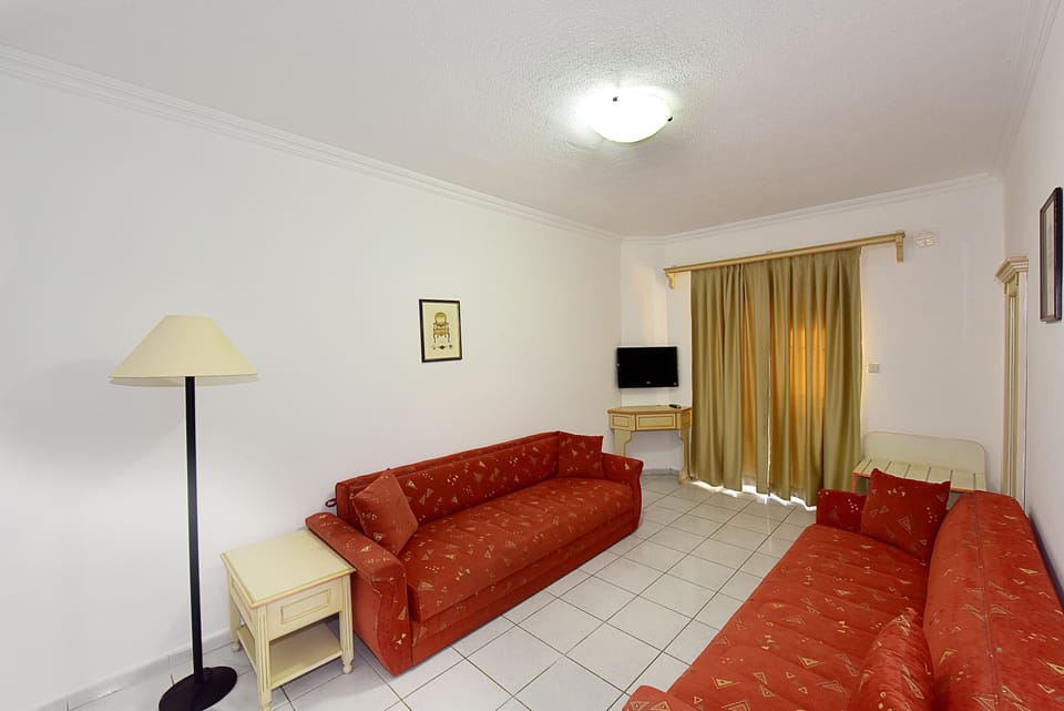 Apartment, 1 Bedroom | Living area | LCD TV