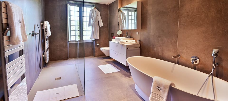 Presidential Suite | Bathroom | Shower, rainfall showerhead, designer toiletries, hair dryer