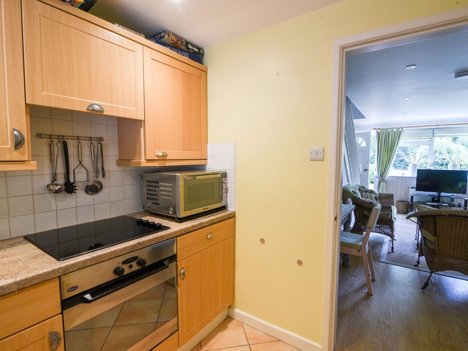 Fridge, electric kettle, cookware/dishes/utensils