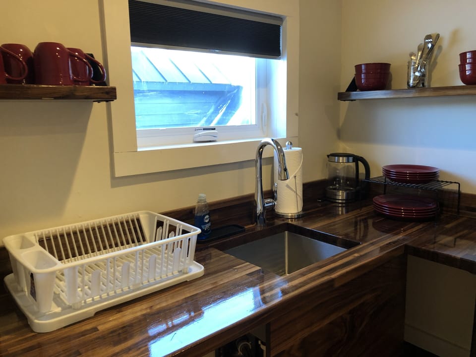 Suite, Private Bathroom (Efficiency Apartment) | Iron/ironing board (on request), WiFi (free), bed sheets