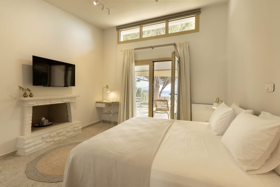 Family Room, 2 Bedrooms, Sea View | Desk, laptop workspace, blackout drapes, soundproofing