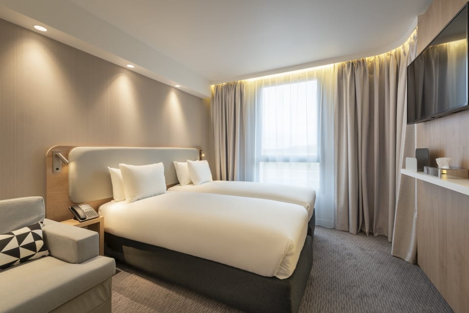 Premium bedding, individually furnished, desk, blackout drapes