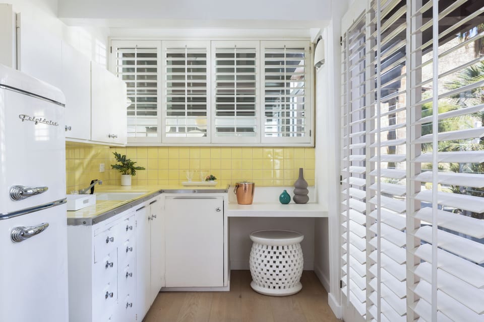 Deluxe Double Room, Kitchenette | Private kitchen | Fridge, coffee/tea maker