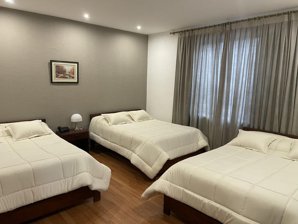Traditional Triple Room | Blackout drapes, WiFi (free), bed sheets