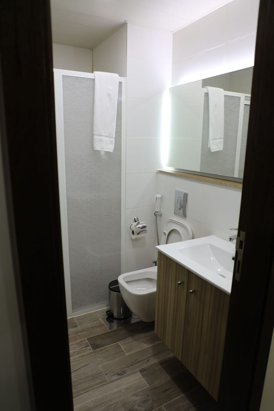 Shower, rainfall showerhead, hair dryer (on request), bathrobes
