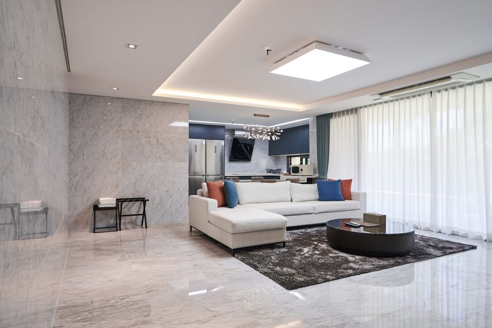 Premium Villa, 3 Bedrooms | Living area | 56-inch LCD TV with cable channels, TV, heated floors