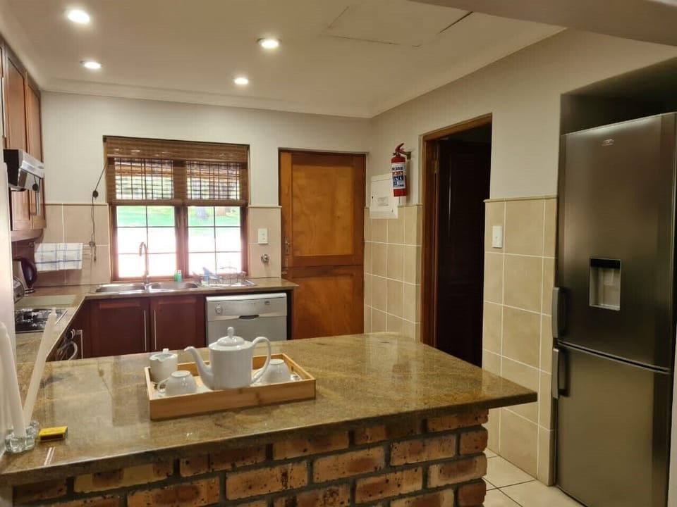 Family Chalet | Private kitchen | Fridge, microwave, oven, stovetop