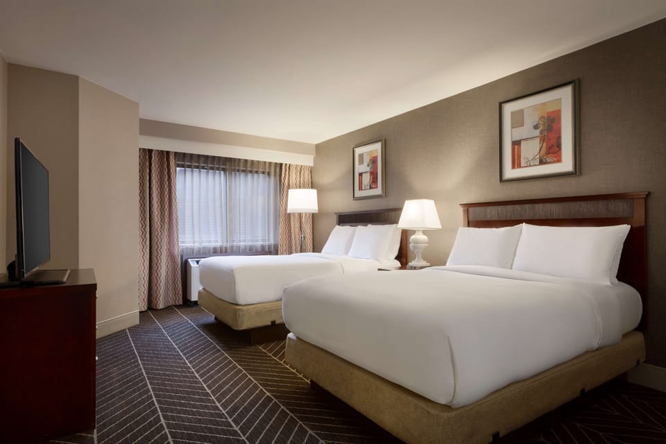 Hypo-allergenic bedding, in-room safe, desk, laptop workspace