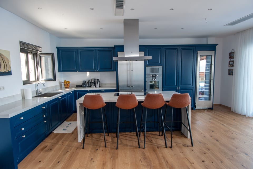 Villa | Private kitchen | Full-size fridge, microwave, oven, dishwasher