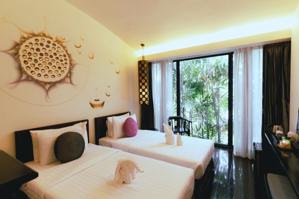 Free minibar, in-room safe, individually decorated, blackout drapes