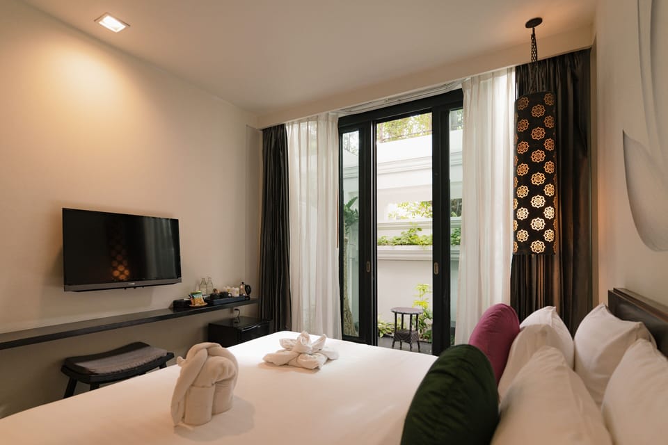 Free minibar, in-room safe, individually decorated, blackout drapes