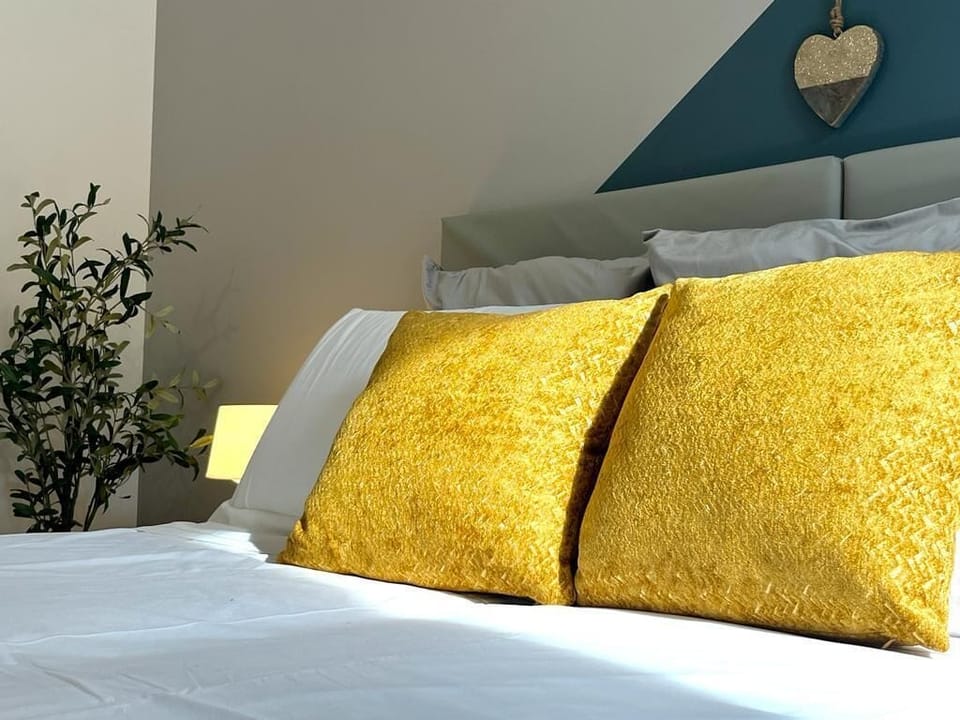 Family Apartment | Down comforters, desk, laptop workspace, blackout drapes