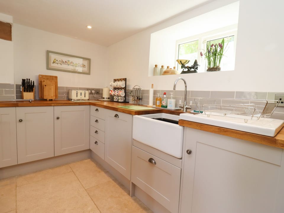 Fridge, electric kettle, toaster, cookware/dishes/utensils