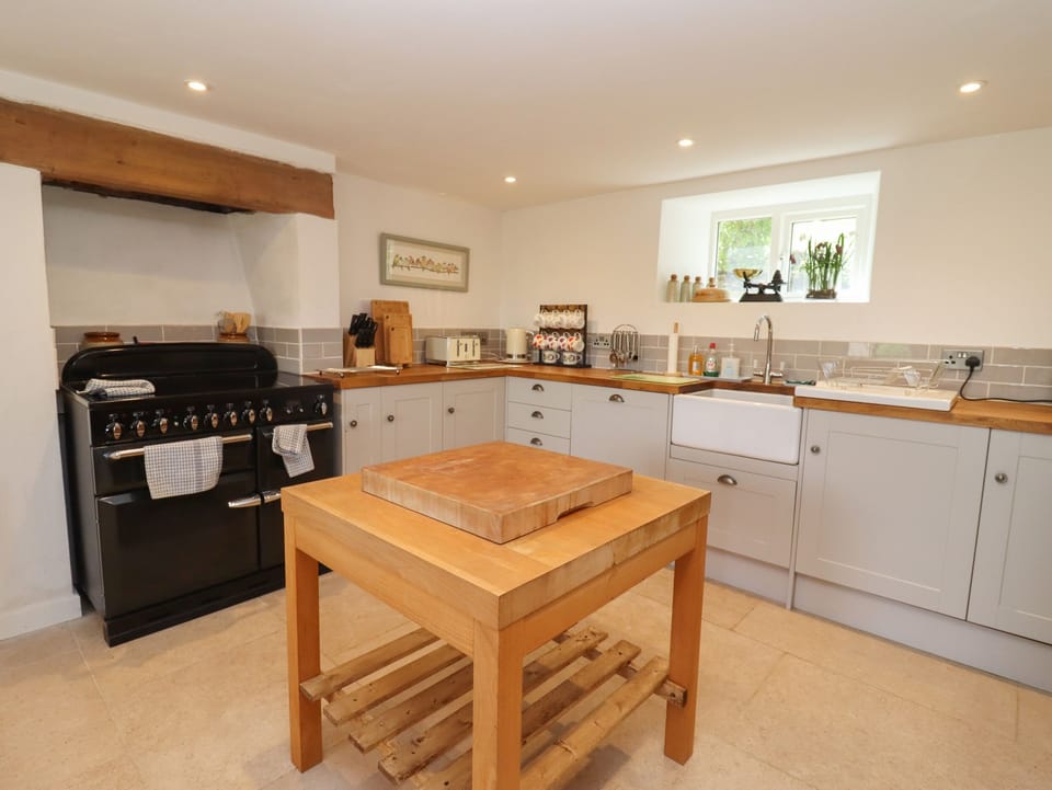 Fridge, electric kettle, toaster, cookware/dishes/utensils