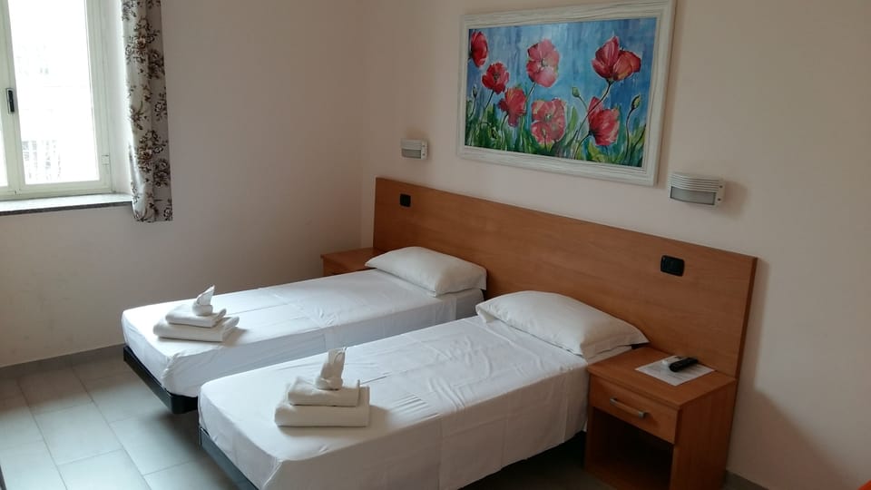 Double or Twin Room | Minibar, in-room safe, desk, WiFi (free)