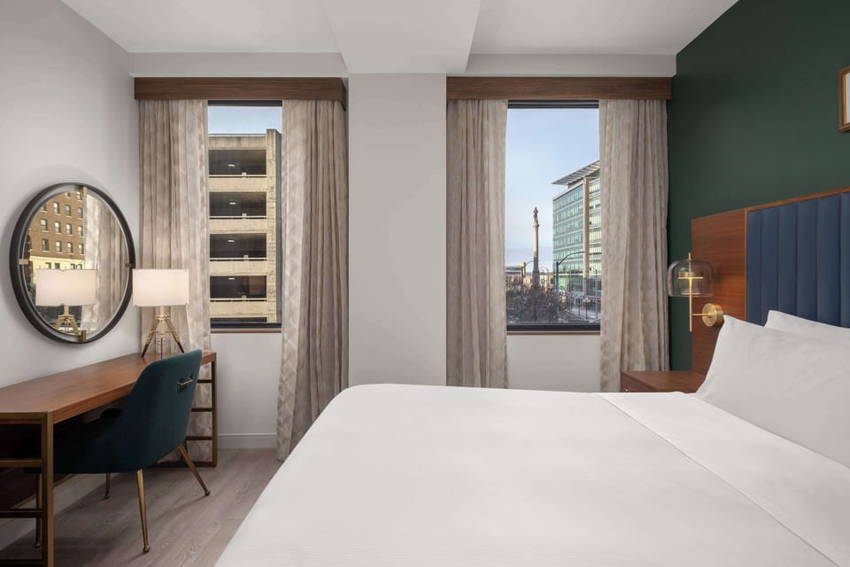 Premium bedding, down comforters, in-room safe, desk