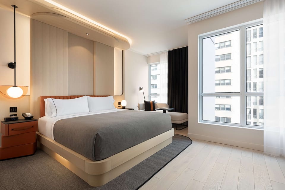Hypo-allergenic bedding, down comforters, in-room safe, desk