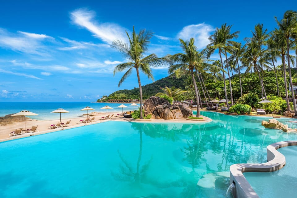 2 outdoor pools, open 7:00 AM to 7:00 PM, pool umbrellas, sun loungers
