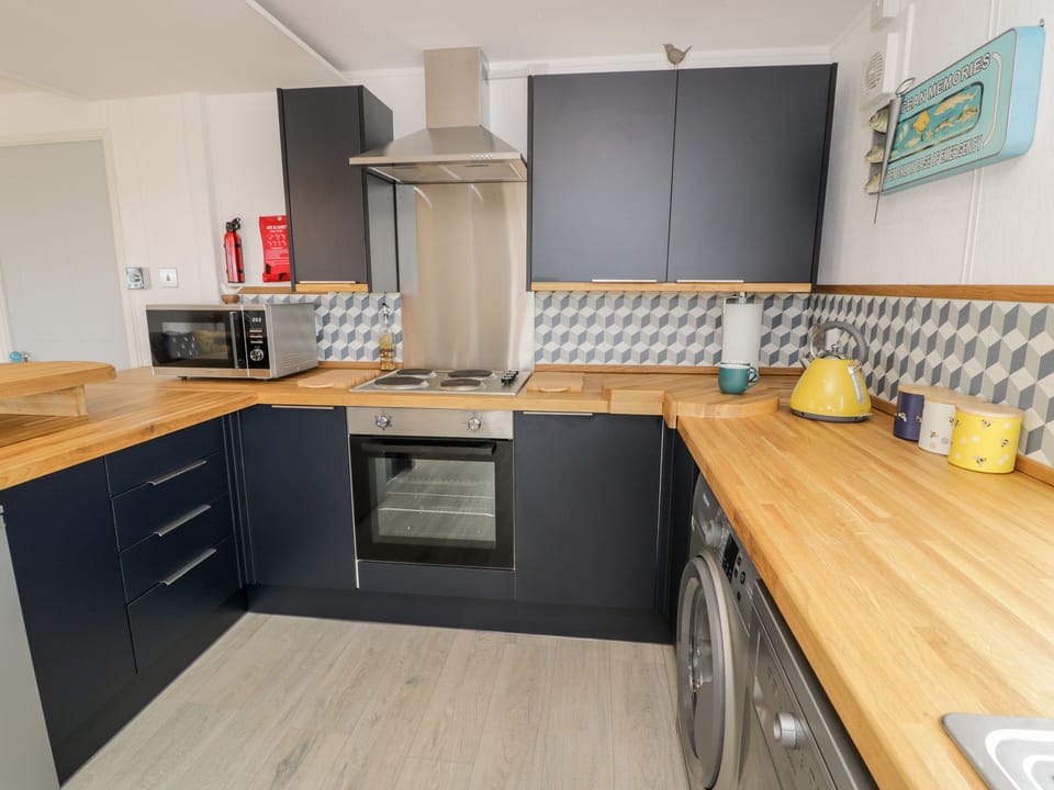 Fridge, dishwasher, electric kettle, cookware/dishes/utensils