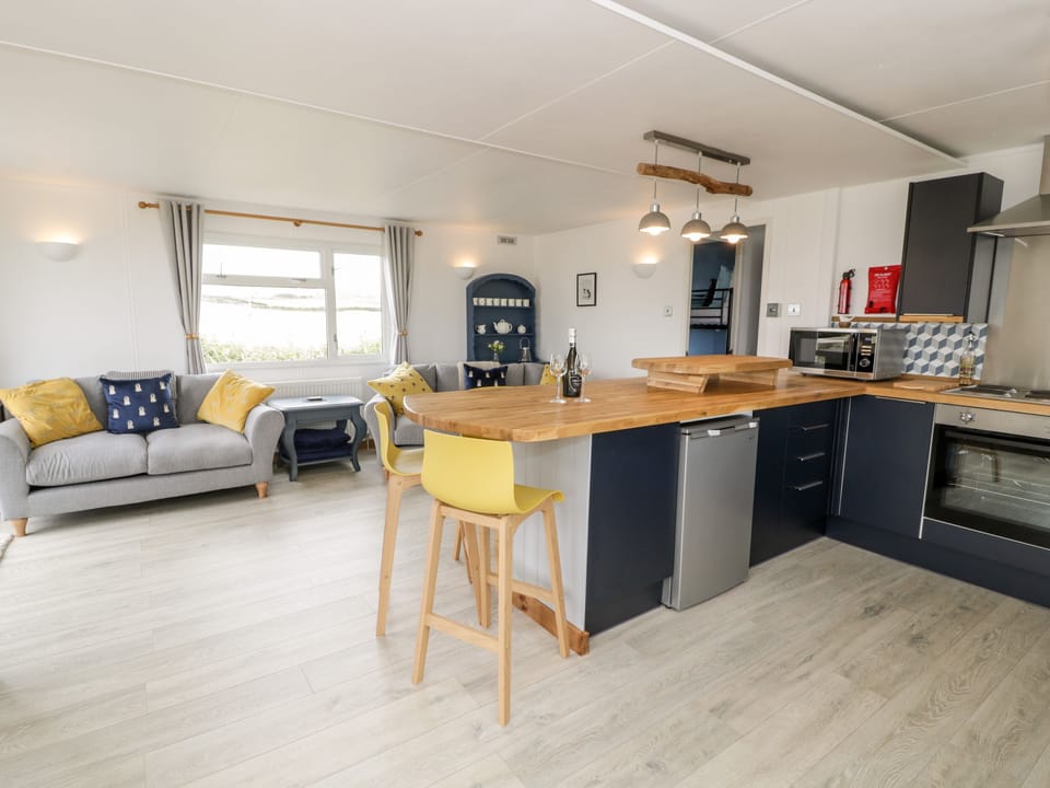 Fridge, dishwasher, electric kettle, cookware/dishes/utensils