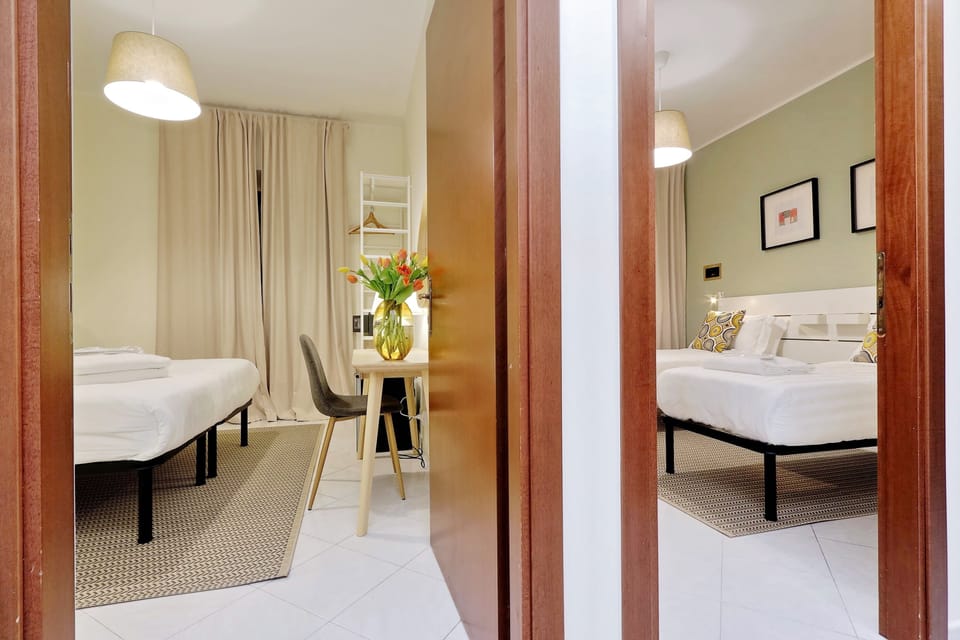 Family Suite | In-room safe, desk, blackout drapes, iron/ironing board