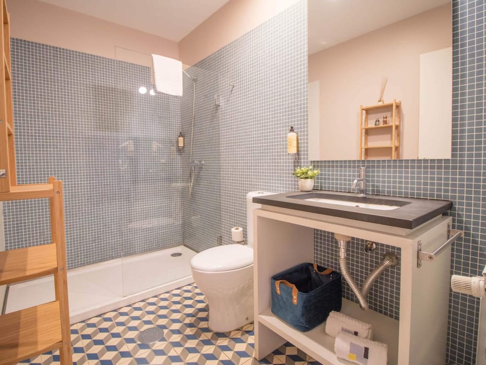Designer toiletries, hair dryer, towels