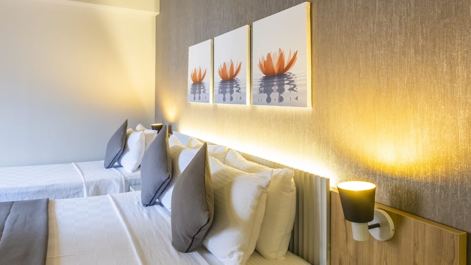 Deluxe Triple Room | Frette Italian sheets, premium bedding, minibar, desk