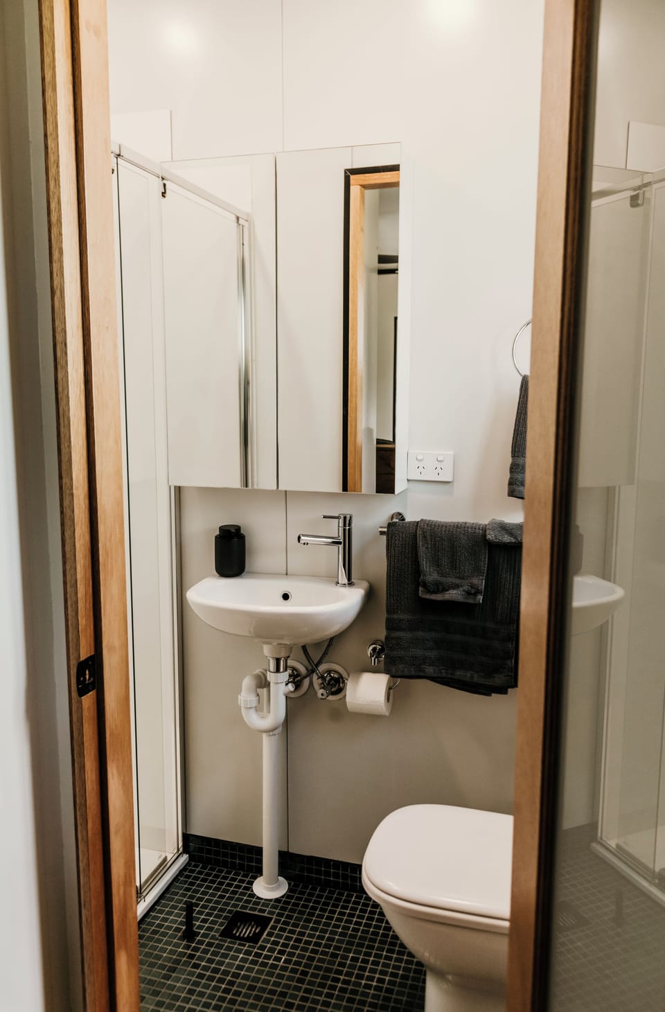Shower, rainfall showerhead, eco-friendly toiletries, towels