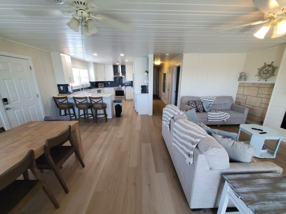 House, Multiple Beds, Pool Access, Beach View | Living area | 40-inch flat-screen TV with cable channels, TV