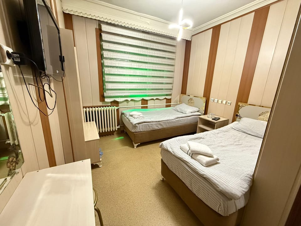 Shower, hair dryer, slippers, towels