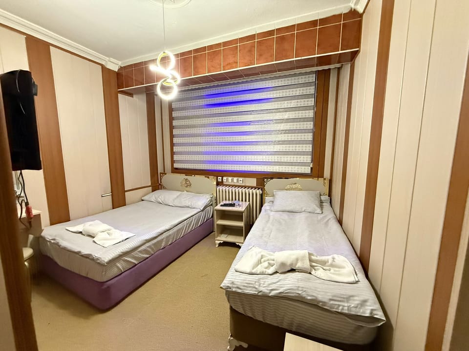 Premium bedding, laptop workspace, free WiFi, bed sheets