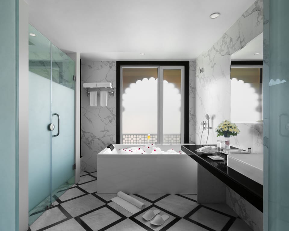 Suite | Bathroom | Shower, rainfall showerhead, hair dryer, slippers