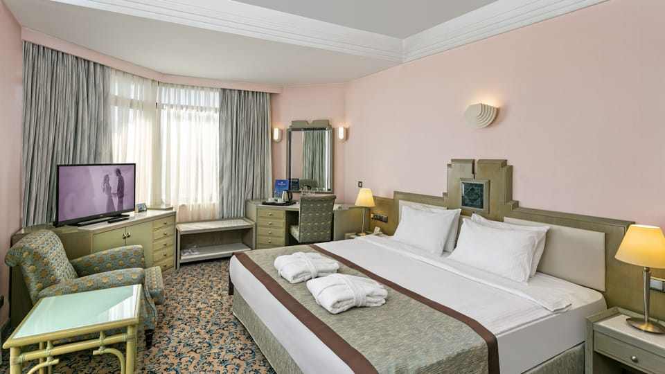 Premium bedding, minibar, in-room safe, desk