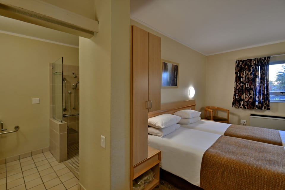 Twin Room, Accessible, Non Smoking | Desk, blackout drapes, iron/ironing board, free WiFi
