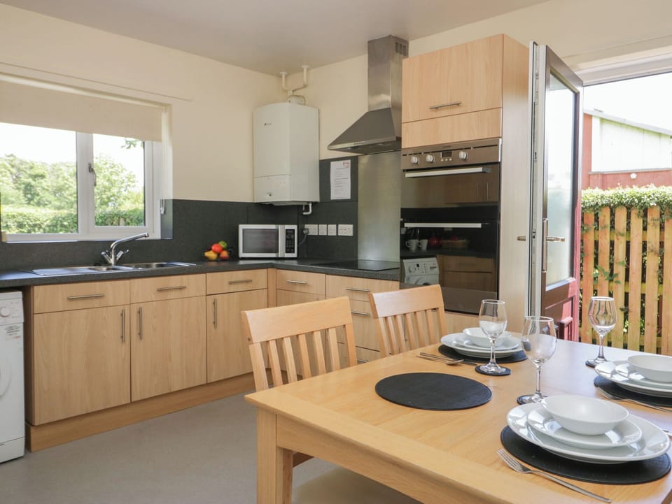 Fridge, electric kettle, toaster, cookware/dishes/utensils