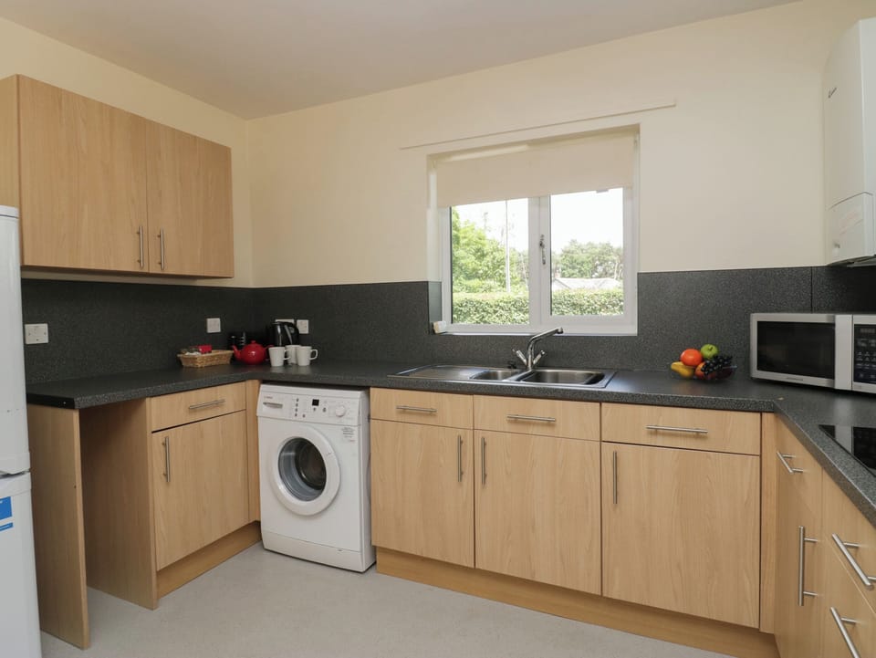 Fridge, electric kettle, toaster, cookware/dishes/utensils