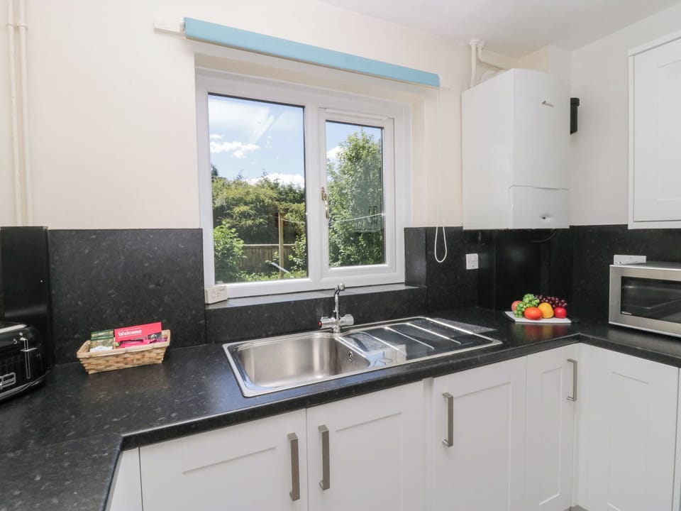 Fridge, electric kettle, toaster, cookware/dishes/utensils