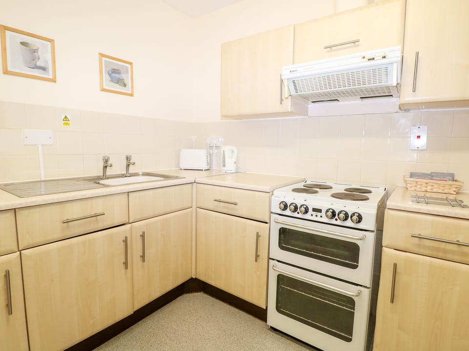 Fridge, electric kettle, toaster, cookware/dishes/utensils