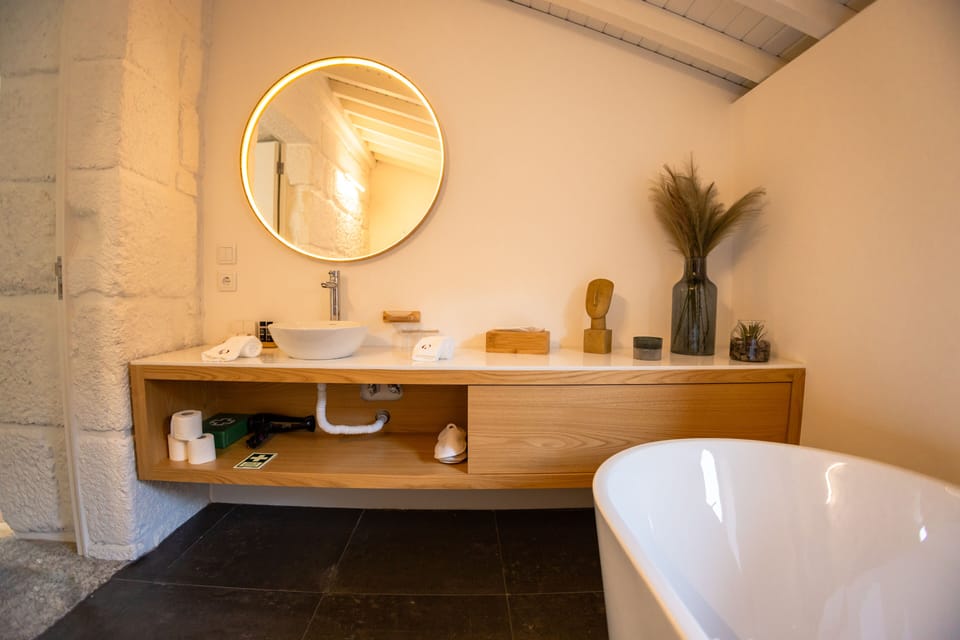 Luxury House | Bathroom | Rainfall showerhead, free toiletries, hair dryer, bathrobes