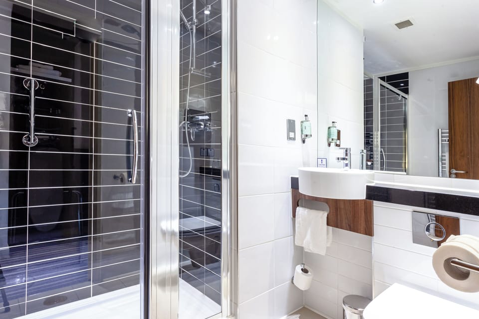 Shower, eco-friendly toiletries, hair dryer, towels