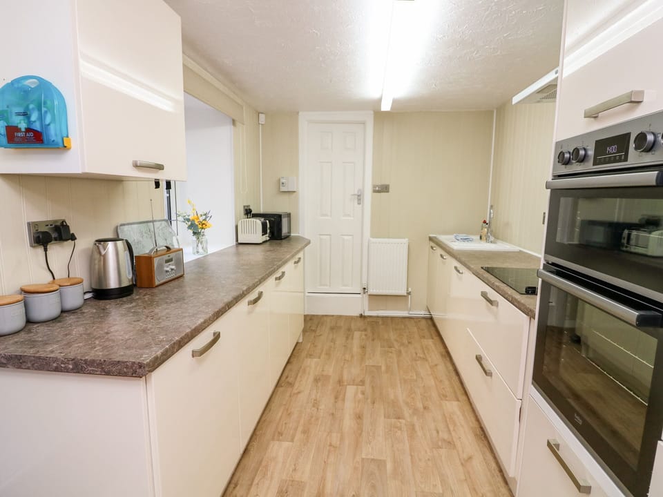 Fridge, dishwasher, electric kettle, toaster