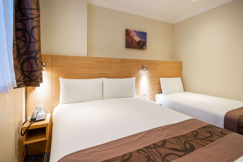 Standard Room, Multiple Beds, Non Smoking | In-room safe, desk, iron/ironing board, free WiFi